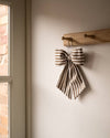 Brown stripe hanging bow detail