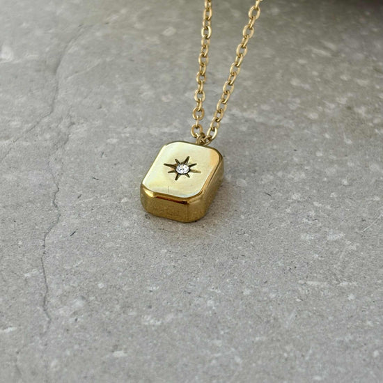 Gold block necklace detail