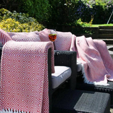 Woven diamond throw coral pink detail