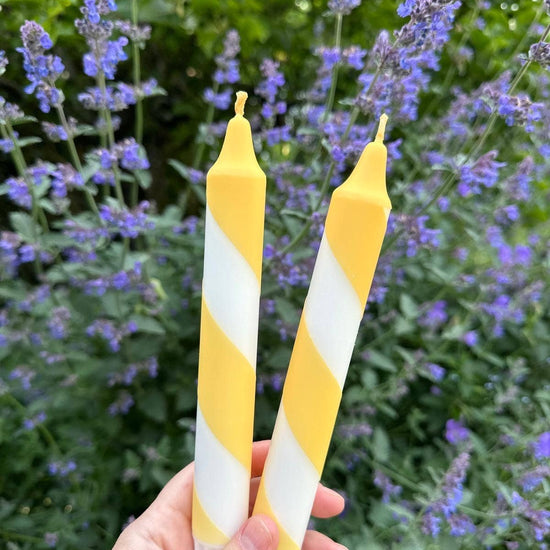 Butter yellow candy cane candles detail