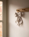 Beige stripe hanging bow detail